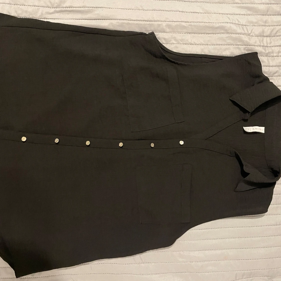 Svart ärmlös skjorta från Amisu