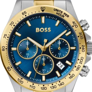 Blå och guld klocka från Hugo Boss - Snygg och elegant HUGO BOSS herrklocka med kronograf funktion. Klockan har ett blått urtavla och ett armband i tvåfärgad metall (silver och guld). Den är i nyskick och kommer i originalförpackning. Perfekt som present eller för egen användning.  En helt ny oöppnad Original Hugo boss klocka.  Jag skickar gärna video om så önskas.   Material & Utförande Tillverkare: Hugo Boss Modell: 1513767 Rek. pris 4 710 kr  Typ: Herrklocka, Dress / Sportmodell Diameter: Ø 45.00 mm Tjocklek: 12.00 mm Boett: Bor