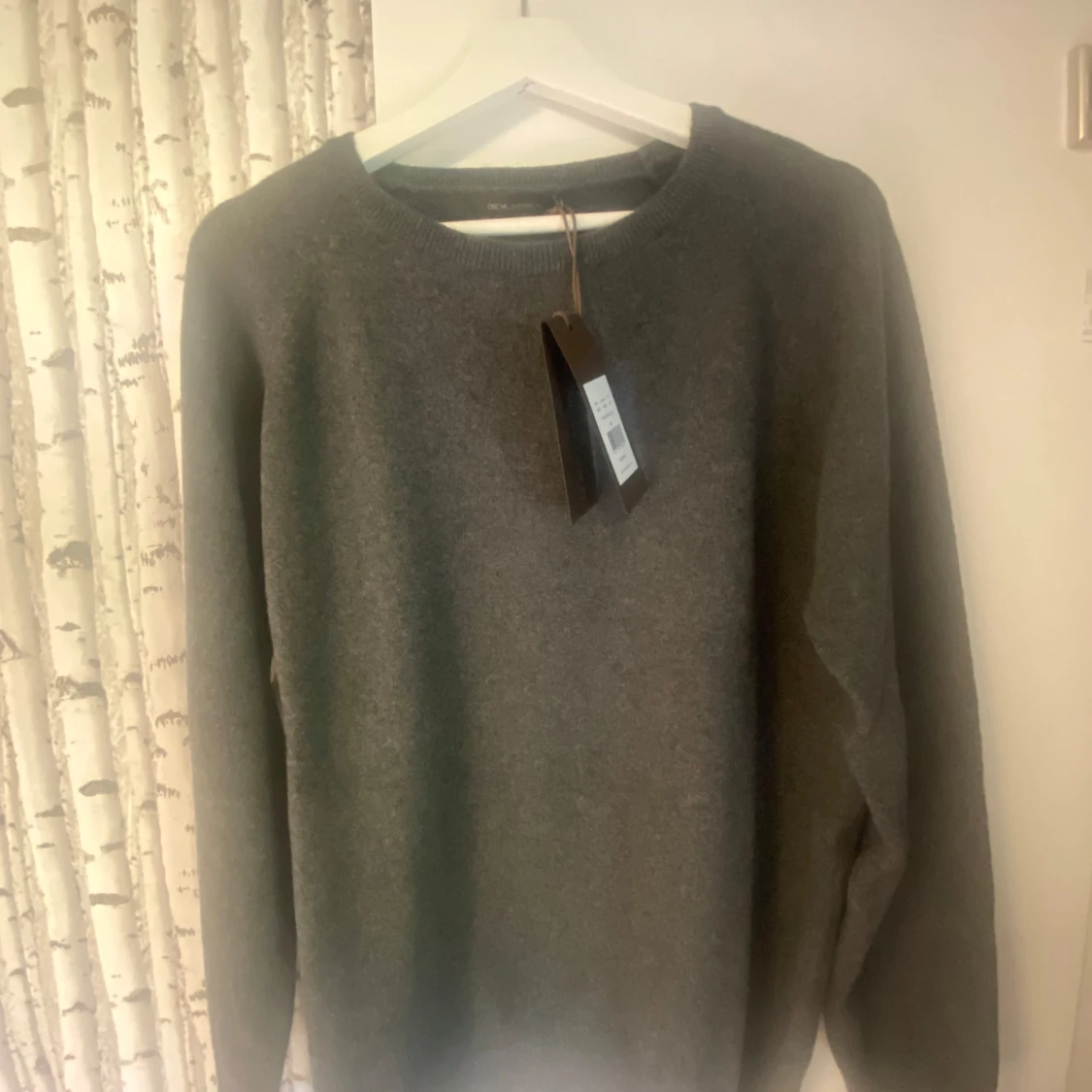 Grå tröja från Oscar Jacobson