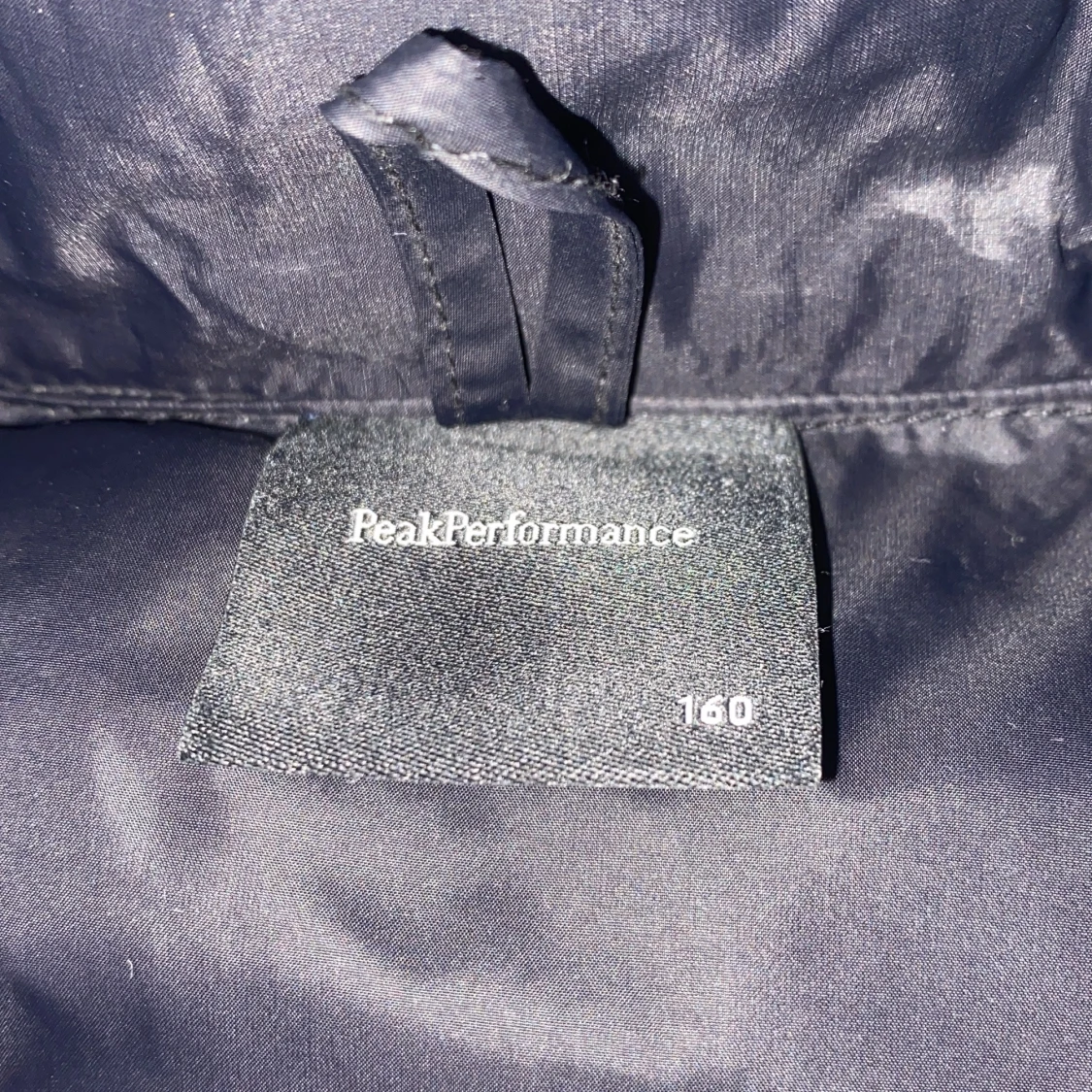 Svart dunjacka från Peak Performance - 91