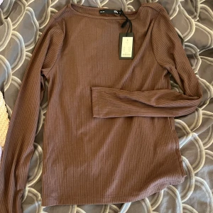 Tröja - En långärmad tröja från lager 157, helt oanvänd