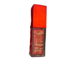 Clarins Sparkling Lip Oil - mer än halva kvar.