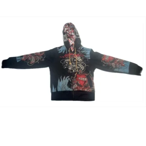 Vändbar Ed Hardy huvtröja - Säljer en cool vändbar Ed Hardy huvtröja. Huvtröjan är fodrad med ett coolt tryck. I väldigt bra tryck. 