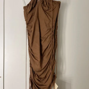 Santorini dress från Adoore - Helt oanvänd.