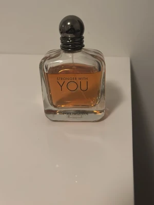 Stronger with you, Emporio Armani parfym - Öppnad Stronger with you parfym som hade 100ml från början, den är använd lite men den har mestadelen kvar. 