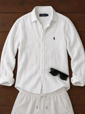 Ralphlauren - linneskjorta - Säljer denna riktigt snygga linneskjorta från Ralph lauren. Den är använt ett par gånger så skicket är fof mycket fint. Det är ett väldigt tunt material. Storleken är XL men passar L. Skriv vid fler frågor eller bilder.