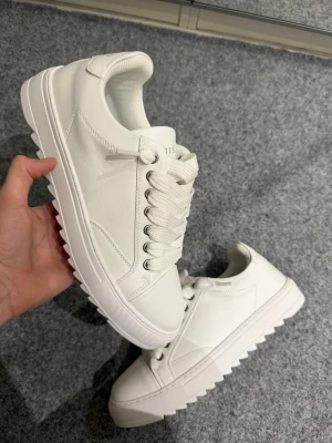 Numeris white shoes 45 - Size 45, true to size. Very comfortable and soft. Brand new, never worn outside. 