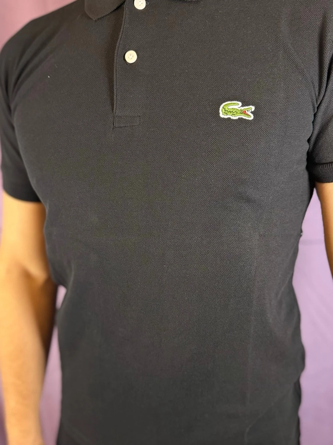 Svart pikétröja från Lacoste