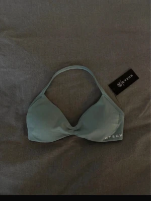 Gtech träningstopp - Helt ny med lappen kvar, säljer pga att den inte passar mig tyvärr. Aldrig använd. Storlek: S (men passar Xs skulle jag mer säga). Färg: pistachio 