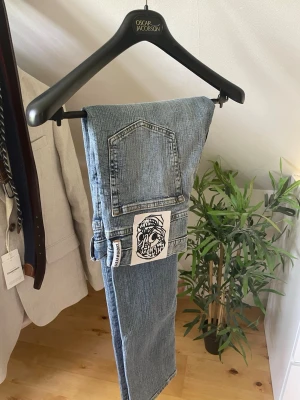 Jeans Cheap Monday - Helt nya jeans från Cheap Monday. Ljus färg i storlek 30/32