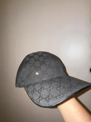 Svart GG keps - Snygg svart keps från i mkt bra skick