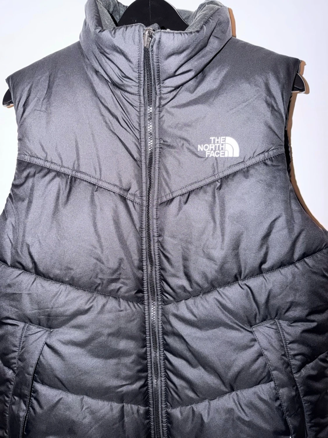 Svart dunväst från The North Face