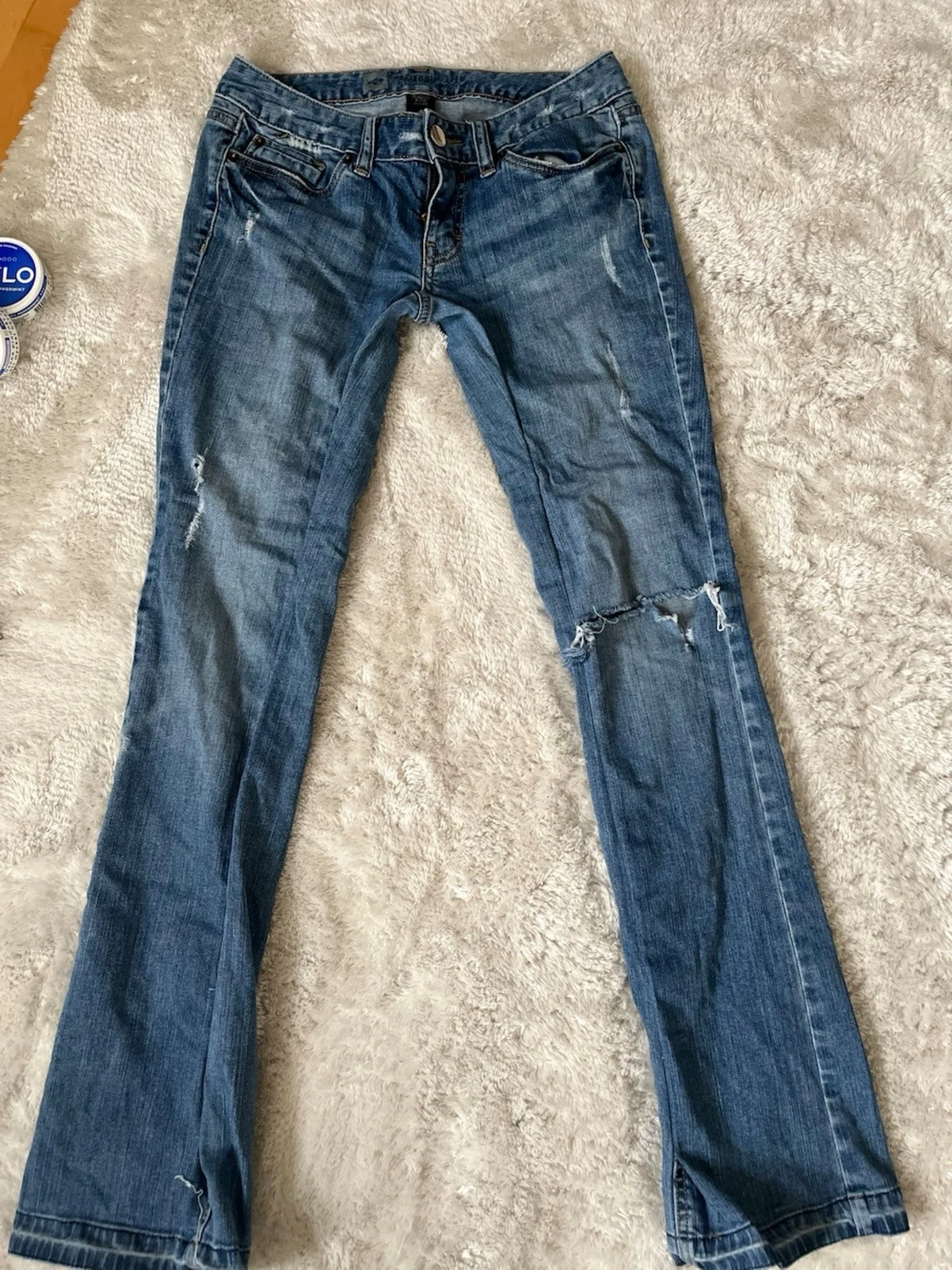 Lågmidjadf bootcut jeans med hål - 1