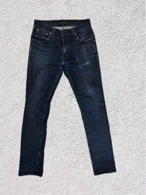 Nudie jeans  - Bra skick, väldigt snygga fades. Mått finns även bild med dom på