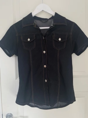 Jeans top - DISCUSS PRICE Never used. Cinched waist. Size XS-S. No sign of distress on material (check photos) 