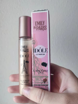 Lancome Idole Emily In Paris - Lancome Idole Emily In Paris Perfume. 33ml bottle. New! Discontinued scent. Great all year around fragrance.