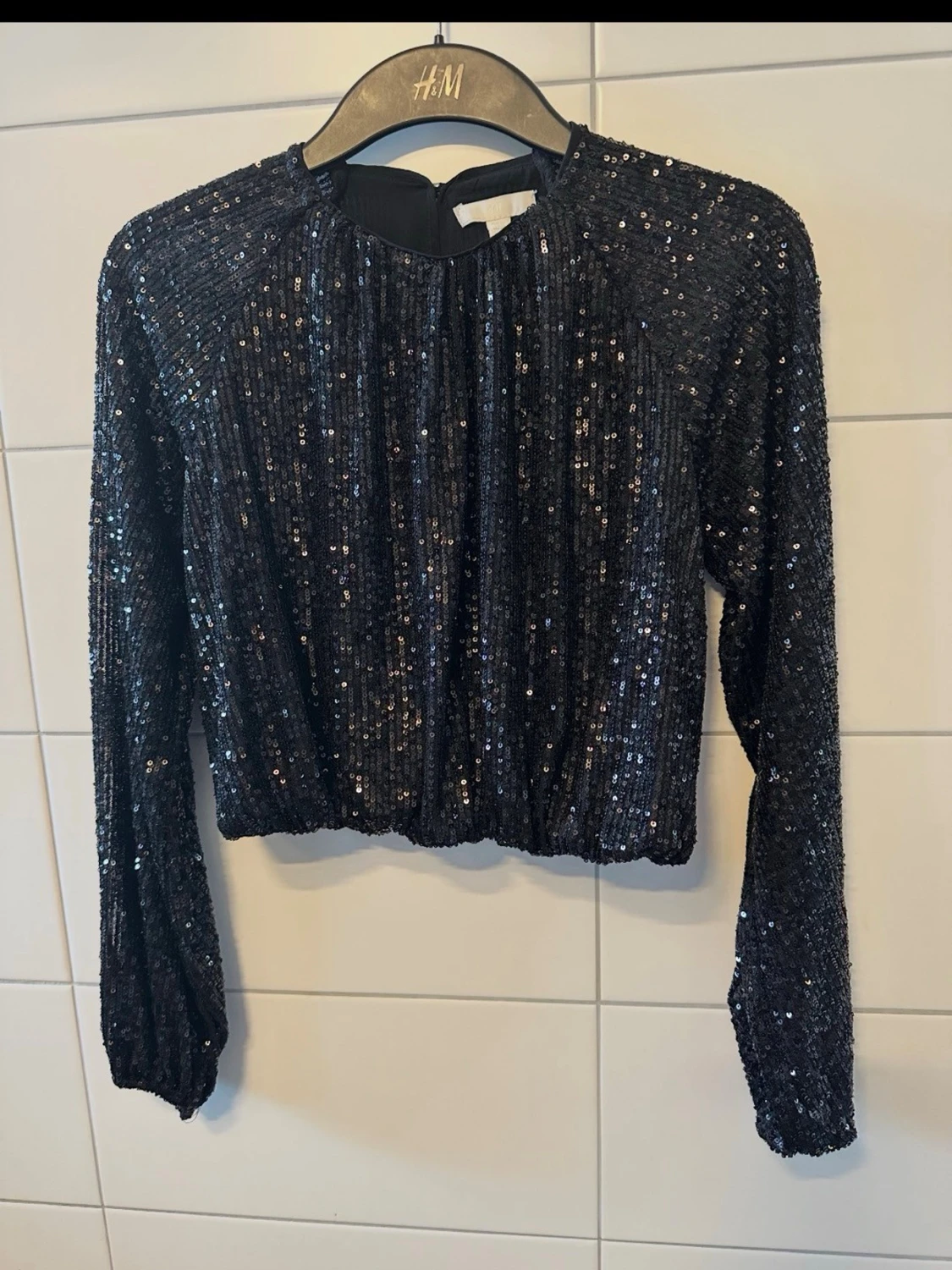 Glittrig tröja 