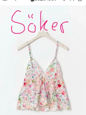 Blommig broderad linnetopp - Söker denna toppen i storlek 34!