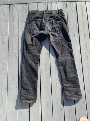 Nudie jeans Dude Dan - Snygga Nudie jeans i modellen dude Dan, 100% organic cotton, snygga fades! Storlek 32/32. Hör av dig vid frågor!