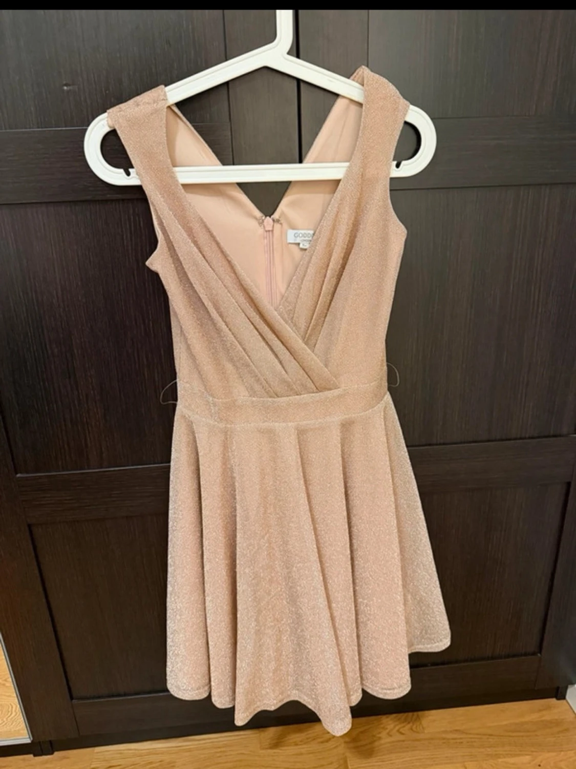 Klänning Ljusrosa glittrig omlottklänning