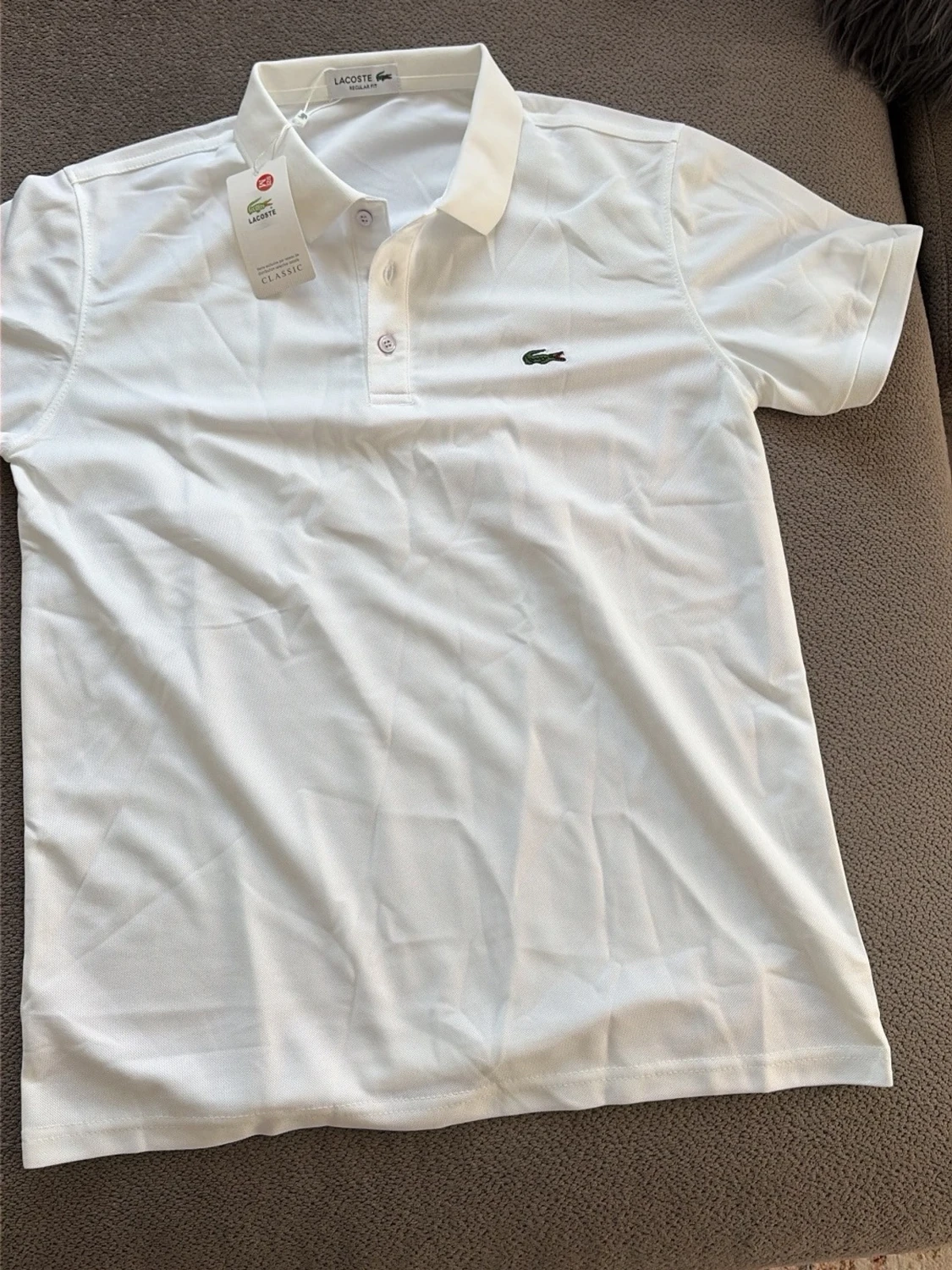 Vit pikétröja från Lacoste - 1