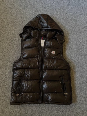 Moncler black vest - Size M, true to size. Very comfortable and fits nicely. Brand new