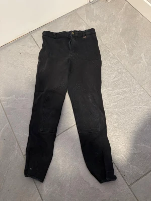 Svarta ridleggings med förstärkning - XS/XXS.