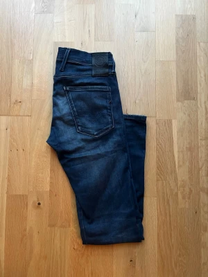 Replay Anbass W29 L32 - Säljer ett par feta Replay Anbass i fint skick utan deflekter. Kom Pm för fler bilder eller andra funderingar!