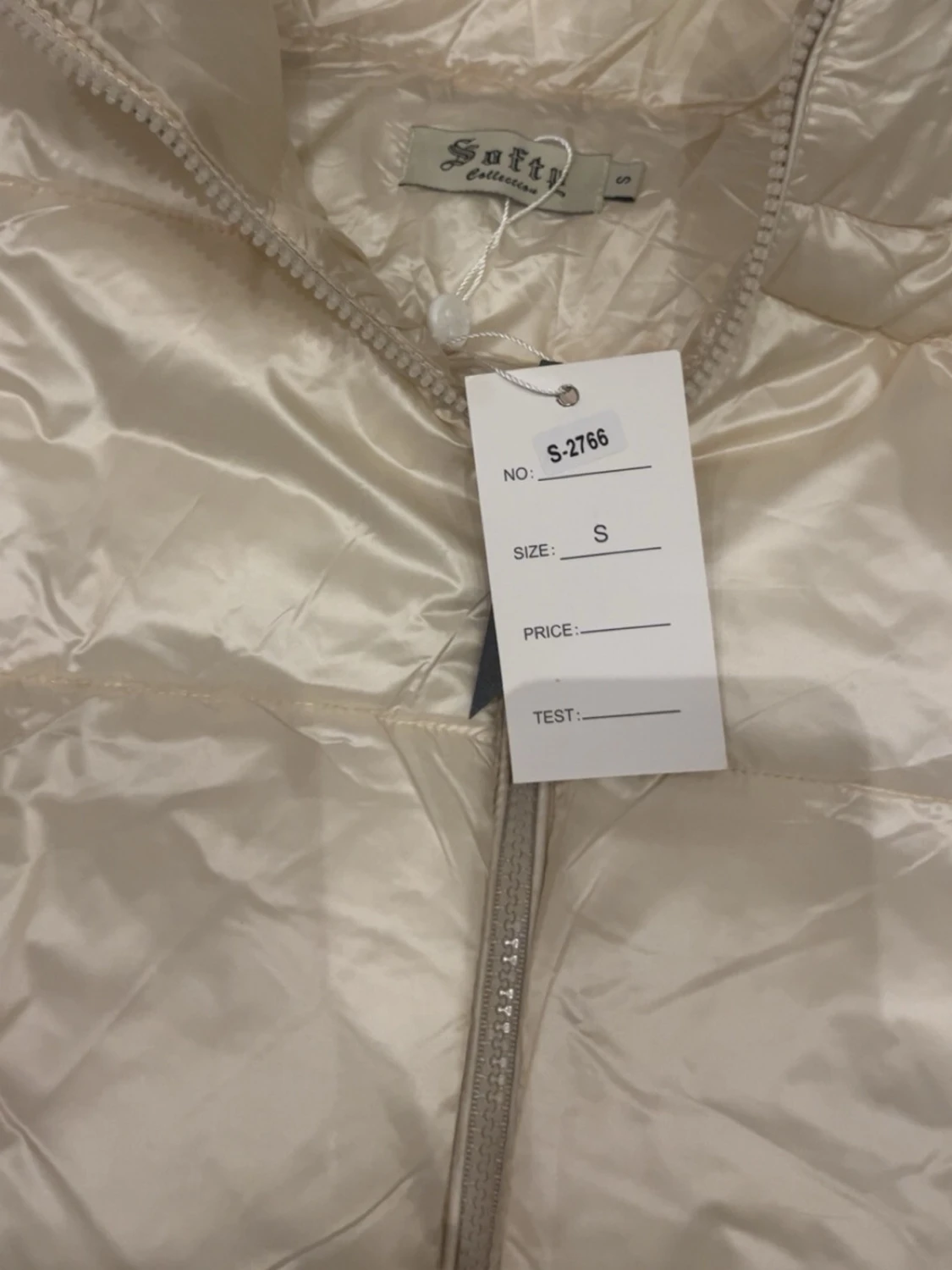 Krämvit dunväst från Softy, S - 1