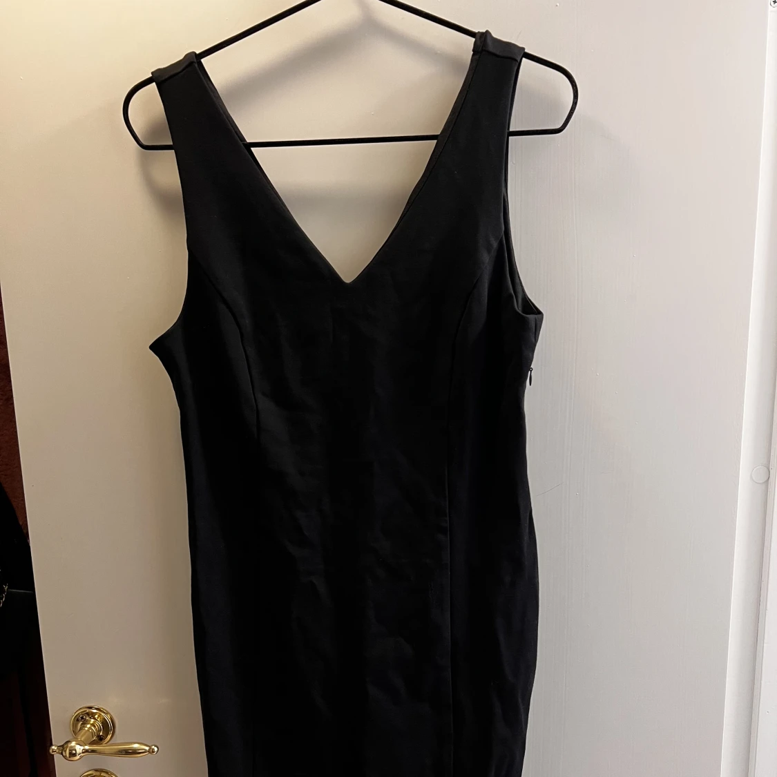 Svart tajt kläning - 90