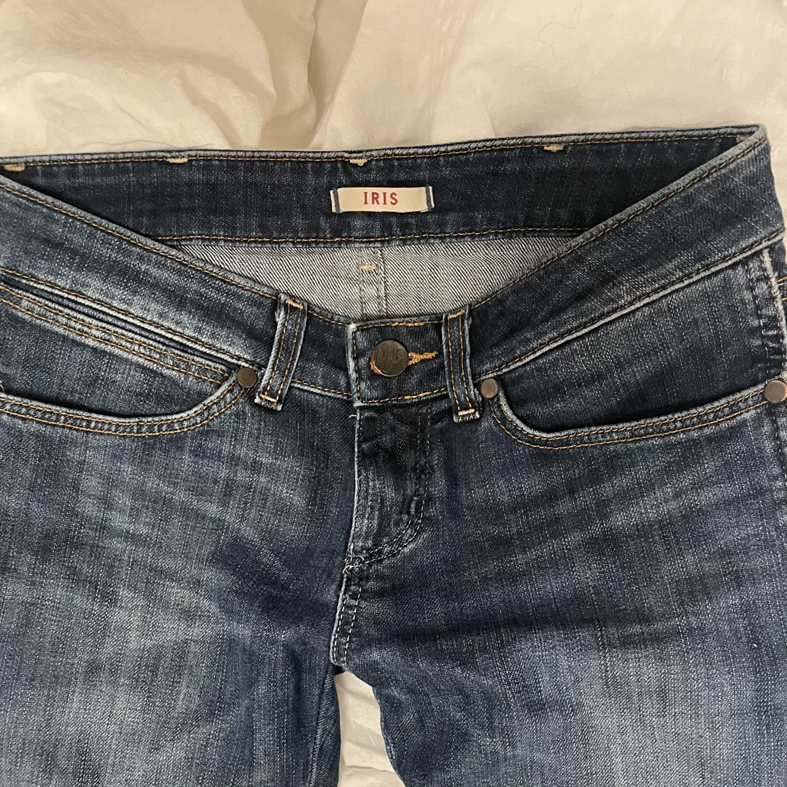 lågmidjade flare wrangler jeans - 91