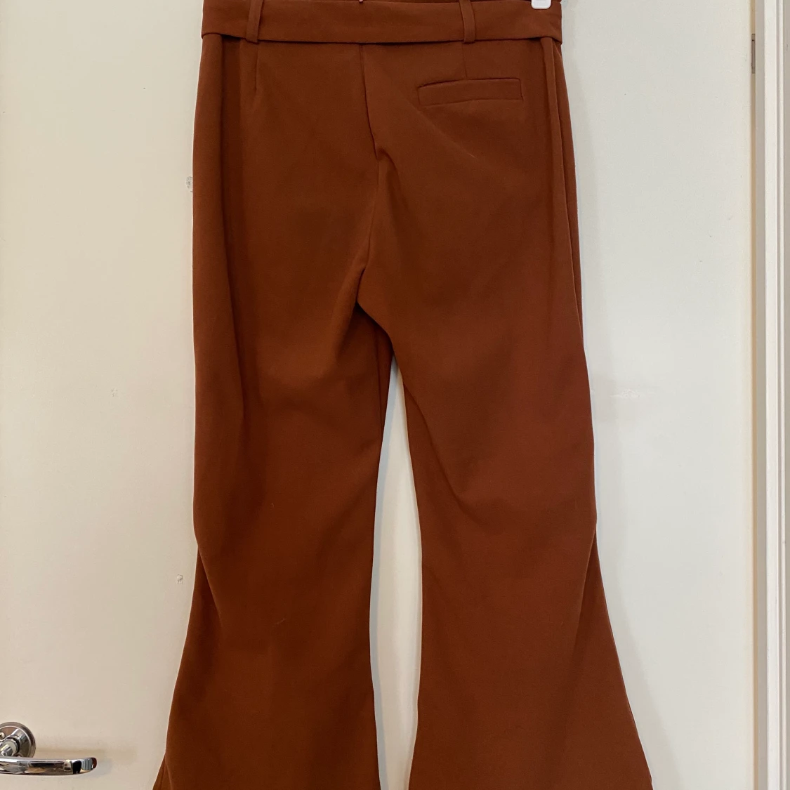 Byxor med tillhörande skärp strl S - 90