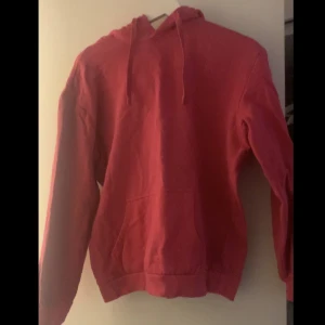  Hoodie  - En rosa hoddie har aldrig använt 