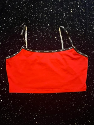 Levi’s tank top  - cute red levi’s tank top, never really worn it, in brilliant condition 