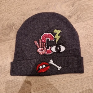 Paljett mössa - Mössa med paljettmotiv