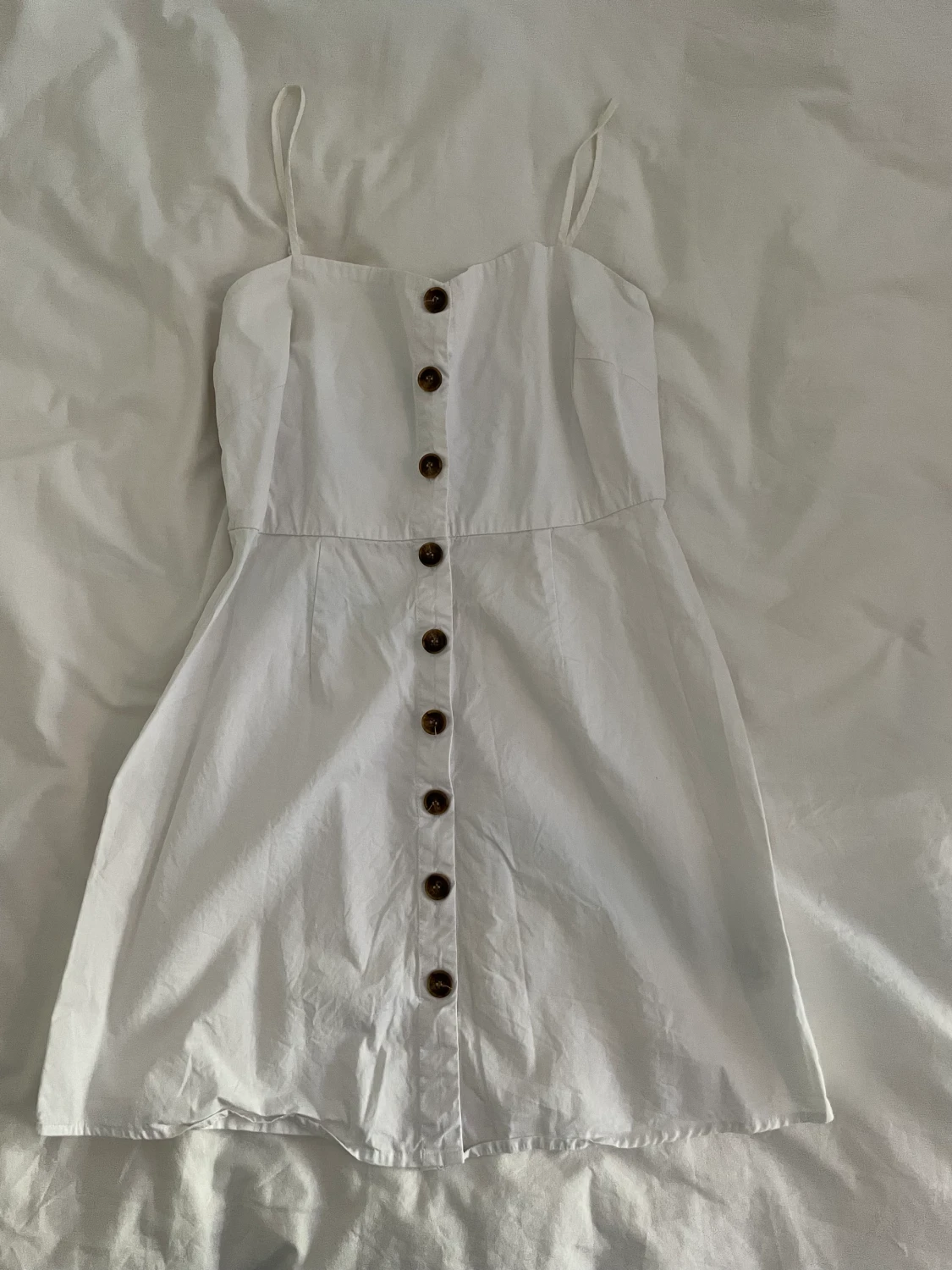 Klänning med knappar 