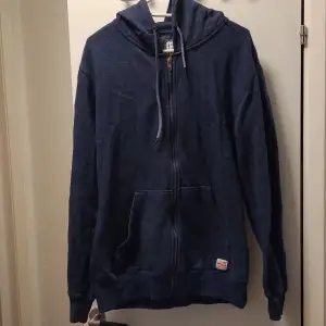 Large size lightly used in fine condition blue hoodie, there is blue ink spill on the pocket.  Feel free to contact for more info. & in Swedish