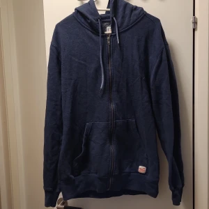 Blue hoodie - Large size lightly used in fine condition blue hoodie, there is blue ink spill on the pocket.  Feel free to contact for more info. & in Swedish