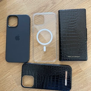 Apple iPhone 12 PRO Max skal - SÄLJES TILLSAMMANS (ej separat så ni behöver inte fråga) Använda ngr få gånger innan jag bytte telefon. Alla skalen, mobilskal är i fint skick och passar iPhone 12 PRO Max.   -Apple original silicone case svart MagSafe  -Apple Original transparent genomskinligt MagSafe  -Ideal of Sweden svart croco och guld -Ideal of Sweden plånboksskal (svart medföljande skal inuti) croco och guld. Se mina andra annonser, Zadig, valentino, zara, ysl, Prada, inuikii, Weekday, hm