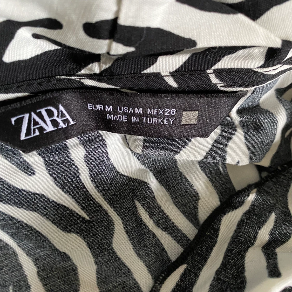 Tigerrandig blus! - 90