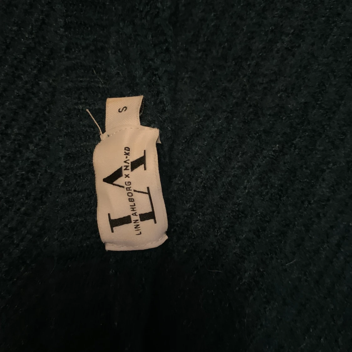 Stickad tröja med öppen rygg - 91