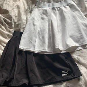 Puma kjol - Två använda kjolar men med bra skick. Ser ut som tenniskjolar. 