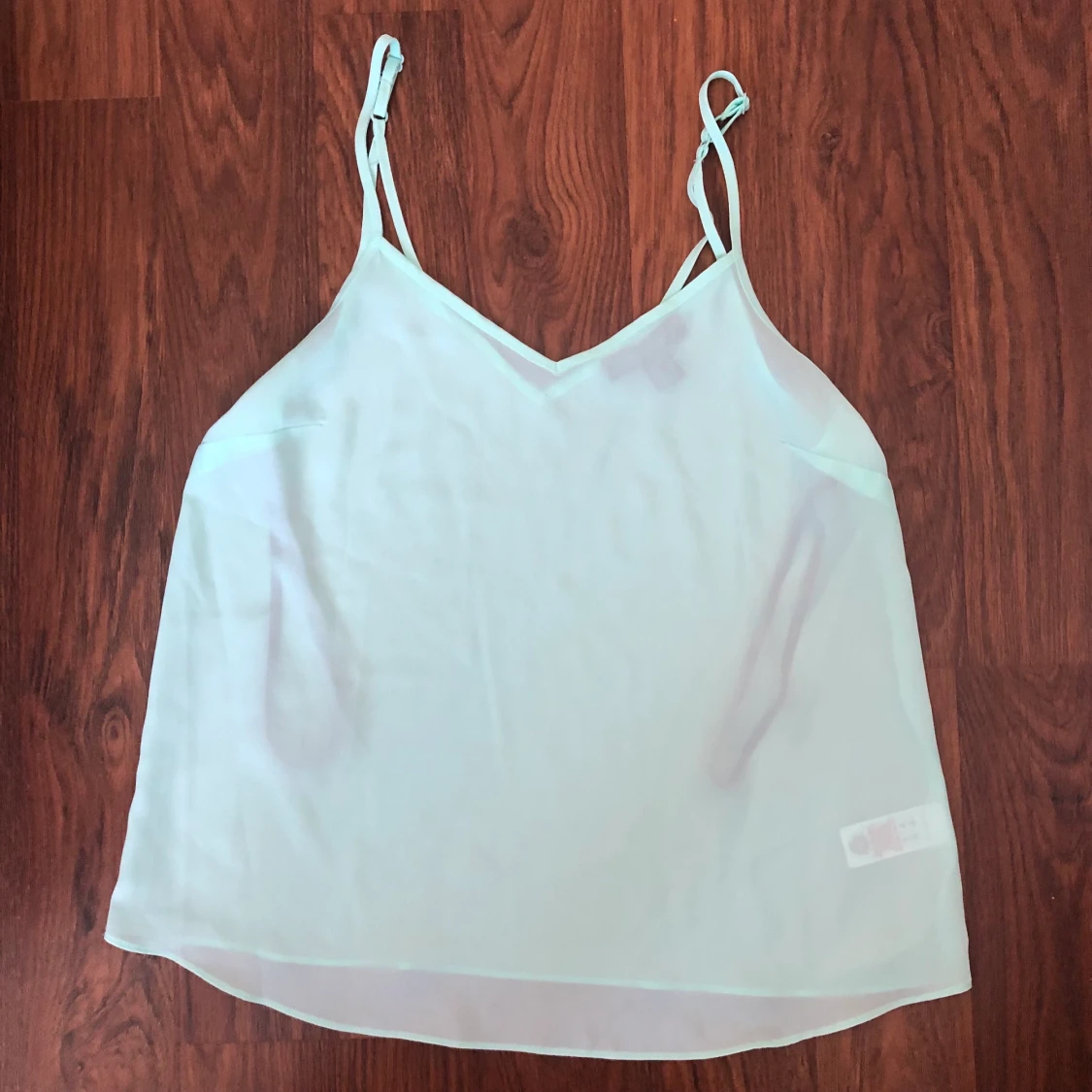 Turkos topp i storlek S