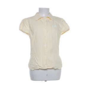 Blus - Gul randig blus från Sellpy. Aldrig använd, säljer för passar inte mig, strl. S/M. Jätte fint skick