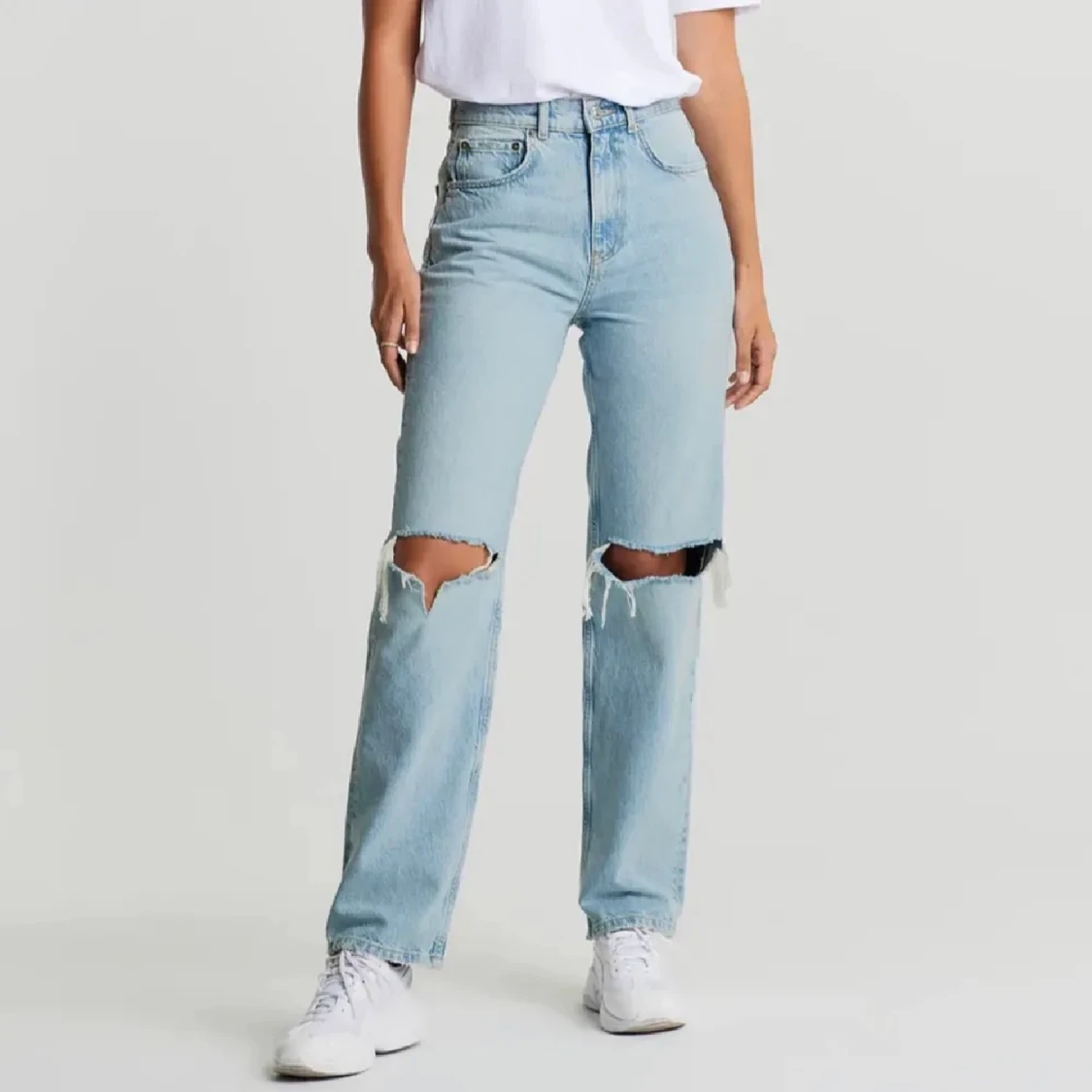 Blå raka jeans