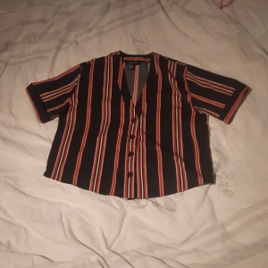 Randig skjorta - Ett plag som går att bära