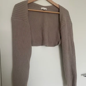 Kofta  - Beige/brun kofta ifrån H&M