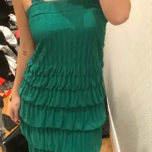 En jätte jätte fin grön klänning som tyvärr aldrig används, storlek S