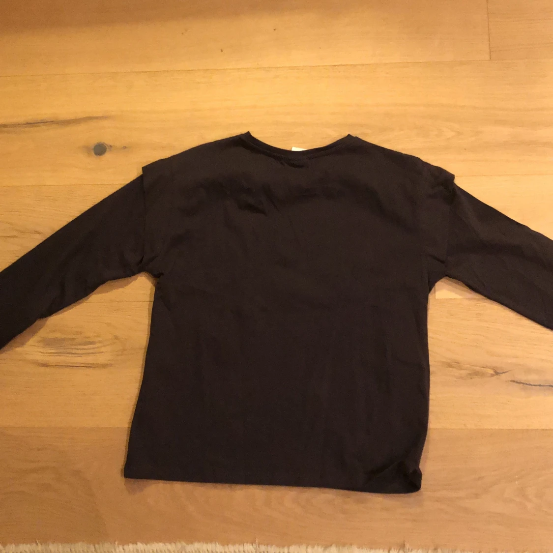 Svart långärmad tröja storlek 10år - 91