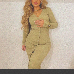 Adoore klänning  - Helt ny adoore 